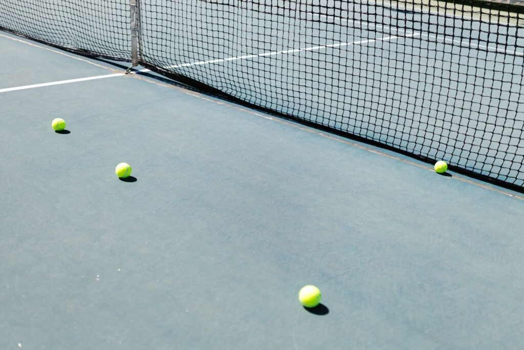 Tennis Surface Volatility: Set Betting and Game Handicaps